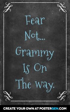 a chalkboard with the words fear not grammy is on the way written in blue