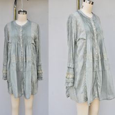 Gorgeous Johnny Was Heavily Embroidered Mini Dress Long Sleeves Color Is A Very Strange And Beautiful- Its A Mix Of Gray & Aqua Blue W/ Ivory Embroidery Button Down - One Button, The Last One Is Different.See Pic. Bohemian Princess - Gypsy Check Out The Sleeves!! Oversized Style Size Xs Measurements Approximately & Laying Flat : Please Refer To The Measurements Provided To Insure Best Fit. Shoulders From Seam To Seam 15" Sleeves 23" Bust 18" Waist Free Or 24" Hips Free Or 32" Length 33" Bohemian Tunic Dress With Buttons, Bohemian Button-up Day Dress, Bohemian Button-up Dress For Daywear, Bohemian Button-up Spring Dress, Bohemian Spring Button-up Dress, Ivory Embroidery, Bohemian Princess, Embroidered Mini Dress, Recycled Clothing