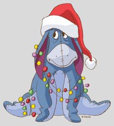 a blue dog wearing a santa hat and christmas lights on it's tail, sitting down