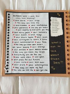 an open notebook with writing on it