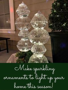 a christmas tree with lights on it in front of a house that says make sparkling ornaments to light up your home this season