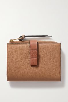 Find LOEWE Two-tone Textured-leather Wallet on Editorialist. Loewe's wallet comes in muted shades of 'Light Caramel' and 'Pecan'. Crafted from textured and smooth leather, the bifold silhouette unzips to reveal multiple slots for your credit cards and slip pockets for notes and receipts, all secured by a single logo-embossed strap. Slip it into one of the label's 'Puzzle' bags. Versatile Brown Leather Wallets, Cognac Leather Wallet, Luxury Soft Leather Brown Wallets, Luxury Brown Soft Leather Wallet, Zip Wallet, Card Holder Wallet, Mr Porter, Net A Porter, Belt Bag