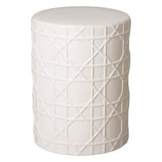 a white ceramic stool with lattice design