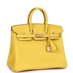 This Birkin is in Jaune de Naples togo leather with gold hardware and has tonal stitching, front flap, two straps with center toggle closure, clochette with lock and two keys, and double rolled handles.The interior is lined with Jaune de Naples chevre and has a zip pocket with an Hermes engraved zipper pull and an open pocket on the opposite side.Collection: DOrigin: FranceCondition: Never worn - (plastic on hardware)- one small red mark on bottom base of bag near corner.Accompanied by: Hermes box, Hermes dustbag, clochette, lock, two keys, clochette dustbag, rainhat, carebook and feltMeasurements: 10" width x 7.5" height x 4.75" depth; 2.75" handle drop Gold Epsom Leather Bag With Branded Hardware, Gold Epsom Leather Bag With Lock, Classic Gold Bag With Lock, Gold Leather Bag With Lock, Gold Epsom Leather Bag With Turn-lock Closure, Birkin Gold, Yellow Birkin Bag, Hermes Birkin 25 Gold, Birkin Bag Orange