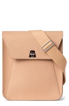 A quietly luxe, minimalist bag in a compact silhouette features the brand's trapezoid turnlock—which subtly references the 'A' in Akris. Turnlock closure Removable, adjustable crossbody strap Exterior slip pocket under flap Leather Imported Designer Handbags Modern Business Bag With Turn-lock Closure, Modern Business Bags With Turn-lock Closure, Modern Business Shoulder Bag With Turn-lock Closure, Modern Shoulder Bag With Turn-lock Closure For Business, Square Shoulder Bag With Palladium Hardware For Business, St Gallen Switzerland, Minimalist Bag, Designer Crossbody Bags, Leather Messenger Bag