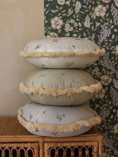 three pillows stacked on top of each other