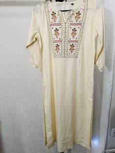 Indian embroidered regular kurti for girls and women size(Small) Cotton Sets With Embroidered Neckline Straight Kurta, Mulmul Straight Kurta With Floral Embroidery, Festive Embroidered Straight Kurta, Embroidered White Churidar For Spring, White Embroidered Churidar For Spring, Spring Straight Kurta With Embroidered Border, Straight Kurta With Embroidered Border For Spring, Spring Embroidered Straight Kurta, Eid Cotton Kurta With Embroidered Neckline