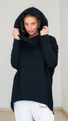 "Plus Size Women Clothing, Hooded Top, Womens Sweatshirt ♠ Wrap into this cocoon-shaped hoodie to level up your urban chic and get an absolute comfort! Styled in the latest trends of oversize and asymmetry, the hoodie gives you a lot space for layering so you can wear it with various favorites and style as you want. Casual style with extravagant touch and ideal for your provocative nature. The delicately crafted pieces from natural materials will embrace your body in a perfect fit. Dare to be Vi Solid Hoodie With Adjustable Hood And Funnel Neck, Winter Long Sleeve Tops With Adjustable Hood, Black Cozy Funnel Neck Top, Cozy Black Funnel Neck Top, Cozy Hoodie With Drawstring Hood, Hooded Tops With Double-lined Hood For Loungewear, Hooded Fleece Top With Adjustable Hood, Hooded Loungewear Top With Double-lined Hood, Fleece Hooded Top With Adjustable Hood