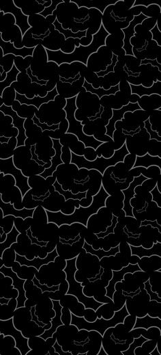 an abstract black and white pattern with clouds