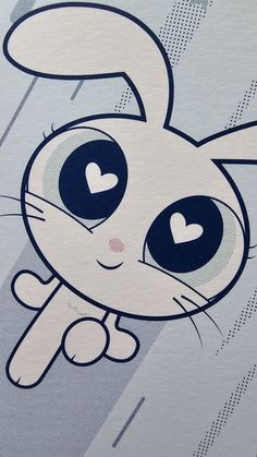 a close up of a cartoon character with big eyes and a heart on it's nose