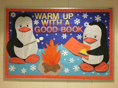 a bulletin board with penguins and a fire in the fireplace reading warm up with a good book