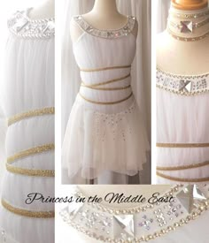 the dress is white and has gold trim