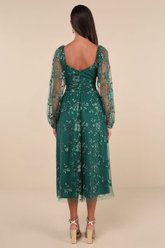 You'll twirl your way into everyone's heart in the Lulus Darling Charisma Emerald Mesh Embroidered Midi Dress! Elegant floral embroidered mesh shapes a sweetheart neckline (with hidden no-slip strips) and sheer, long balloon sleeves (with elasticized shoulders and cuffs) that can be styled on or off the shoulders. A tying sash belt punctuates the high waist that sits atop a flowy skater skirt that ends at a chic midi hem. Hidden back zipper/clasp. Fit: This garment fits true to size. Length: Mid-calf length. Size medium measures 47.5" from shoulder to hem. Bust: Great for any cup size. Waist: Fitted - very fitted at natural waist. Hip: Not Fitted - fuller skirt allows room for hips. Undergarments: May be worn with a strapless bra, adhesive bra, petals, or no bra. Fabric: Fabric has no stre Fitted Dress With Sweetheart Neckline And Floral Applique, Fitted Dress With Floral Embroidery And Sweetheart Neckline, Fitted Embroidered Dresses With Sweetheart Neckline, Bridesmaid Dress With Floral Applique And Sweetheart Neckline, Fitted Embroidered Dresses For Bridesmaids, Fitted Embroidered Bridesmaid Dresses, Bridesmaid Dresses With Embroidered Fitted Design, Embroidered Fitted Bridesmaid Dresses, Spring Embroidered Dress With Sweetheart Neckline