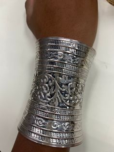 The bracelets are beautifully handcrafted. Made of brass  Free shipping with purchase of above  $ 35 in the store. Thanks for shopping with us and come again. Stay safe https://www.etsy.com/shop/naistumityujewelry Elegant Silver Festival Bracelets, Elegant Engraved Bangle For Festival, Unique Metal Bracelets With Intricate Design, Bohemian Silver Cuff Bracelet With Intricate Design, Adjustable Intricate Design Cuff Bracelet, Bohemian Silver Metal Cuff Bracelet, Bohemian Silver Cuff Bracelet With Silver Beads, Silver Bohemian Metal Cuff Bracelet, Silver Metal Bohemian Cuff Bracelet