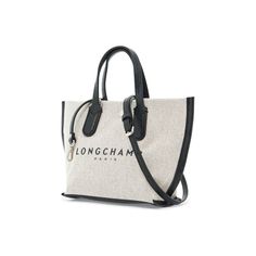 The XS Essential handbag by Longchamp is made of cotton canvas with a rubberized logo lettering and leather base and handles. It features a snap button closure and an unlined interior with a zip pocket. The adjustable and removable leather shoulder strap and silver metal hardware add a touch of elegance to this bag. Makeup Travel Case, Travel Makeup, Beauty Accessories, Travel Case, Metal Hardware, Letter Logo, Leather Handbag, Handbags On Sale, Snap Button