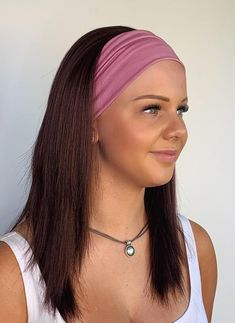 Our headband wigs are perfect for the gym or holidays. They have been specifically designed to be worn up and styled with no visible wefts. These are great for hot weather as they don't have the heaviness of a full wig while still giving total coverage. They hair looks very natural, right down to the fly away strands. The wig comes attached to a base band which is made from a secure elastic and has a velcro fastening. This provides the needed security if you want to tie the hair up high. There i Headband Wig Long, Head Band Wig Ombre Short, Edge Band For Wig, Dyed Headband Wig, Colored Headband Wig, Wigs You Can Swim In, Headband Braided Wigs Bun, Hair Up High, Alopecia Wig