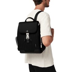 Made in Italy, the RIMOWA Never Still collection is designed with flexibility in mind. Crafted out of premium materials like durable canvas and full-grain leather, the drawstring RIMOWA Never Still Flap Backpack Small in Black features two side zipped pockets, adjustable shoulder straps (min 22 cm, max 41 cm), a padded back for added comfort, and a flap-top secured by a bespoke magnetic buckle emblazoned with the RIMOWA logo. Inside, a large drawstring compartment and a 13-inch laptop-sized padd Black Rimowa, Anarchy Symbol, Unique Gift Guide, Flap Backpack, Daily Bag, Vanity Case, Black Features, Iphone Accessories, Small Backpack