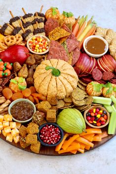 a platter filled with lots of different types of food and snacks on it's side