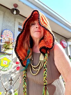 Hand Crochet Hood Unisex Brown/Orange & Green Black trim Free size. Inspired by The Twisted Hatter (her wonderful patterns are on Etsy !) DARE TO BE DIFFERENT ! Bohemian Hats For Fall, One Size Hippie Crochet Hat For Festivals, Bohemian Crochet Hat One Size, Bohemian Crochet Hat For Beach In Fall, Bohemian Crochet Beach Hat For Fall, Handmade Bohemian Crochet Hat For Fall, Handmade Adjustable Bonnet For Fall, Bohemian Beanie Bonnet One Size, Bohemian Bonnet Beanie One Size