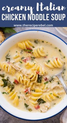 creamy italian chicken noodle soup in a white bowl