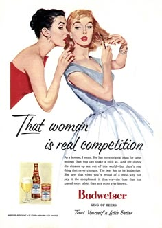 an advertisement for budweiser beer with two women kissing