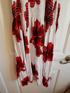 Vintage Ladies Black, Red and Whihte Flower Hawaiian Sun Dress.. very Tropical looking. 100 % rayon. In good vintage condition.. Clean.. no issues. ..I would say it is like a size medium but it has elastic stretch on the bodice area. Red Hawaiian Beach Dress, Red Cotton Maxi Sundress, Red Hibiscus Print Dress For Vacation, Red Hawaiian Dress With Floral Print, Red Hawaiian Floral Print Dress, Hawaiian Style Red Floral Print Dress, Red Hawaiian Dress For Spring, Red Floral Print Sundress, Red Floral Print Sleeveless Sundress