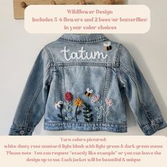 a denim jacket with embroidered flowers on it and the words, wildflower design includes 6 flowers and 2 bees or butterflies in your color choices