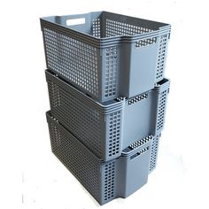 three plastic storage containers stacked on top of each other with holes in the bottom and sides