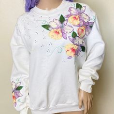 "Women's XL 5050 cotton poly 46\" bust 25\" length Vintage 90s white crewneck sweatshirt with huge orchid appliqués edged in puffy paint and covered in iridescent glitter. Super comfy and very soft. There is some wear from age on the appliqués, a small spot on the front and a light yellowing of the neckline but it still looks awesome" White Crewneck Sweatshirt, Vintage Crewneck Sweatshirt, Puffy Paint, White Crewneck, Vintage Crewneck, Vintage Sweatshirt, Crewneck Sweatshirt, Orchids, Vintage 90s