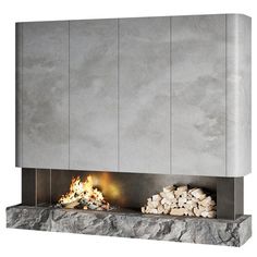 a fire place that is made out of concrete and has logs in front of it