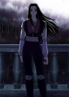 a woman standing in the rain with long hair