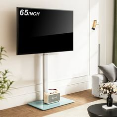 a flat screen tv mounted to the side of a wall