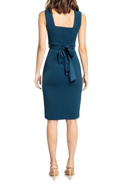 Flattering and sophisticated, this midi-length crepe dress features a figure-skimming silhouette, alluring side slits and a tie that wraps around the waist. 42 1/2" length Hidden back-zip closure V-neck Sleeveless Get the perfect fit—book an appointment with one of our alterations experts Lined 96% polyester, 4% spandex Hand wash, dry flat Imported Women's Clothing Flattering Knee-length Party Dress, Flattering Cut Knee-length Dress For Party, Fitted Belted Midi Dress, Flattering Knee-length Elastane Dresses, Flattering Cut Knee-length Party Dress, Belted Fitted Midi Dress, Sleek Midi Length Elastane Dresses, Sleek Knee-length Elastane Dress, Flattering Formal Dresses In Elastane