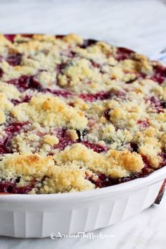 a close up of a casserole dish with crumbs on top and the words plum platz recipe above it