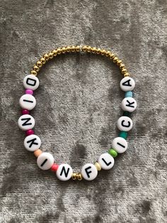 Beaded Bracelet sporting some of the funniest moments from The Office. Buy two get one free 😍. Specific quotes may take more time to ship. Otherwise randomly selected ones will be shipped next day! Novelty Bracelets With Letter Beads, Novelty Letter Beads Wristband Bracelet, Casual Bracelets With Letter Print For Gift, Casual Letter Print Bracelets For Friendship, Casual Letter Print Bracelets For Gift, Casual Letter Print Bracelets As Gifts, Personalized Novelty Beaded Bracelets For Friendship, Personalized Novelty Friendship Bracelets, Personalized Beaded Bracelets For Friendship