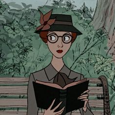 a woman sitting on a bench reading a book