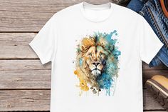 Get in touch with your wild side with our Lion Face T-Shirt! This unique tee features a stunning painted lion face design that is sure to turn heads. Our t-shirt is made from high-quality materials and is perfect for any animal lover or nature enthusiast. Our African-inspired design captures the essence of the wild and makes a bold statement wherever you go. The tee is available in multiple sizes and colors, so you can find the perfect fit for you. Don't settle for boring t-shirts - make a state Lion T Shirt, Majestic Lion, Lion Tshirt, Lion Face, Layered Streetwear, Face Design, Wild Life, African Inspired, Animal Shirts