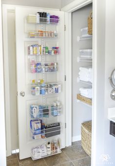 an organized pantry in the corner of a room with white walls and tile flooring