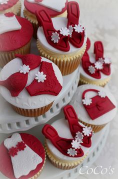 cupcakes decorated with red and white decorations