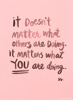 a pink wall with a quote on it that says, it doesn't matter what others are doing