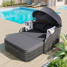 an outdoor chaise lounge next to a swimming pool