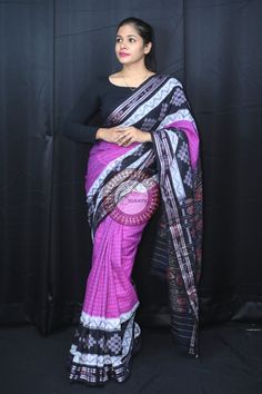 Weaver communities of Maniabandha and Nuapatana of Odisha traditionally weave this kind of saree. Common motifs are star, temple, conch, rudraksh, fish, chakra, lotus etc. The inspiration of all its designs comes from nature. It is the best of single ikat; one of warp and weft is tied and dyed prior to weaving. The borders and the pallas have tremendous variety and each one of them is attractive and praiseworthy. Specification:  Occasion: Festive Wear Fabric: Khandua Cotton Primary Color: Purple Black Traditional Wear With Weaving Work For Puja, Ceremonial Multicolor Saree With Weaving Work, Traditional Pre-draped Saree For Puja With Weaving Work, Ceremonial Pink Handloom Traditional Wear, Traditional Purple Wear With Woven Motifs, Pink Saree With Woven Motifs For Puja, Traditional Purple Handloom Pre-draped Saree, Traditional Pink Saree With Woven Motifs, Pink Traditional Saree With Woven Motifs