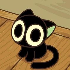 a black cat sitting on top of a wooden floor next to a wall with eyes