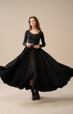 Step back in time with our Victorian Style Skirt, where every stitch reflects exceptional craftsmanship. Revel in the elegance of this skirt adorned with a graceful flare that flows seamlessly as you walk or dance, creating a captivating presence at the Renaissance Festival or any historical event.  You'll be pleased with these ruffles. Why not pair it with a simple, casual blouse and let this skirt be the focal point of your look. 【Fabric】 100% linen. 220g/gram. thick weight. It is washed with special technique and not easy to wrinkle. 【Size】 *SIZE XS waist: 26"/ 65 cm *SIZE S waist: 27"/ 70 cm *SIZE M waist: 29/ 75 cm *SIZE L waist: 31.5" / 80 cm SIZE XL Waist: 33"/ 85cm SIZE XXL waist : 35" / 90 cm SIZE 3XL waist : 37" / 95 cm Gothic Flowy Ruffled Skirt, Flowy Ruffled Maxi Full Skirt, Bohemian Dress With Voluminous Ruffled Skirt, Bohemian Dress With Ruffled Voluminous Skirt, Spring Gothic Long Maxi Skirt, Spring Gothic Maxi Skirt, Black Bohemian Dress With Flowy Skirt, Bohemian Full Pleated Skirt Dress, Bohemian Dress With Ruffles And Full Skirt