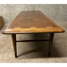 a wooden table with arrows painted on it