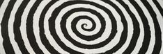 a black and white spiral pattern is shown