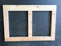 the frame is made out of wood and ready to be hung