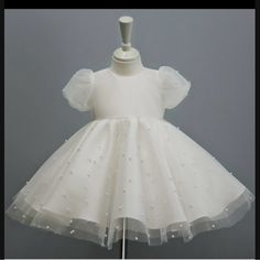 White Dress. Never Worn. Two Different Detachable Bows White Pageant Dresses, Baby In Wedding Dress, Baby Baptism Dress, Crinoline Skirt, Flower Girl Dresses Tutu, Tulle Flower Girl, First Communion Dresses, Wedding Dresses With Flowers, Girls Pageant Dresses