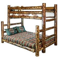 a wooden bunk bed with two pillows on it