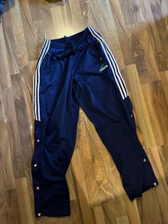 Adidas Sweatpants Pants Size M Vintage Adidas 90s Track Button Pants Fits like M! fits like M! Casual Bottoms With Buttons For Streetwear, Streetwear Trousers With Button Closure, High Waist Pants With Button Closure For Streetwear, High Waist Button Closure Streetwear Bottoms, Cotton Streetwear Bottoms With Buttons, Cotton Bottoms With Buttons For Streetwear, Wide Leg Bottoms With Buttons For Streetwear, Retro Streetwear Bottoms With Button Closure, Casual High Waist Pants With Snap Buttons